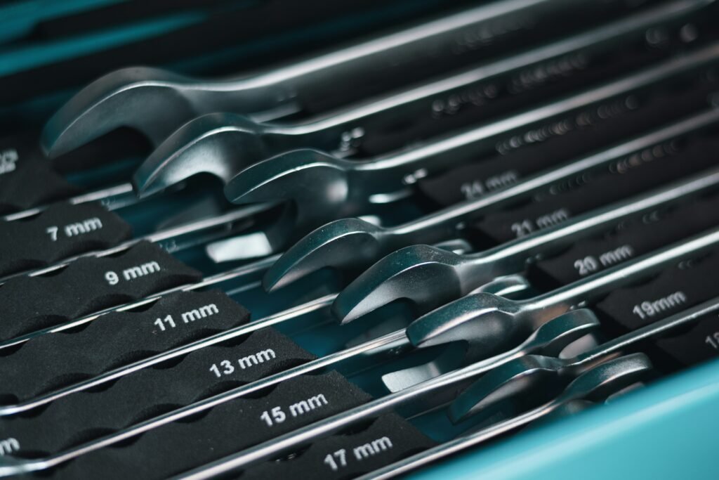 An array of essential plumbing tools arranged neatly in a toolkit